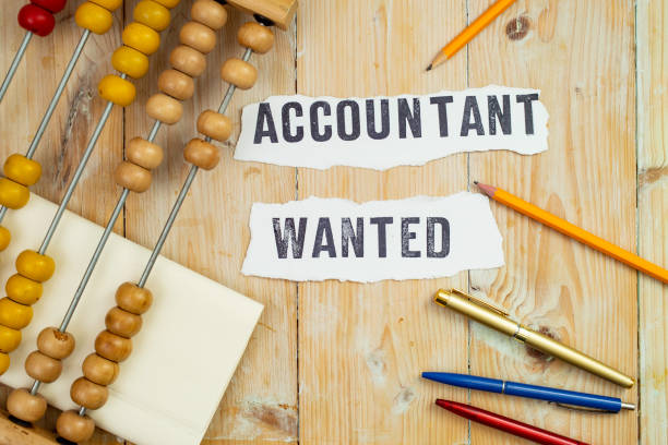 istock Accountant wanted written on white paper strips with stamped letters 1449032500
