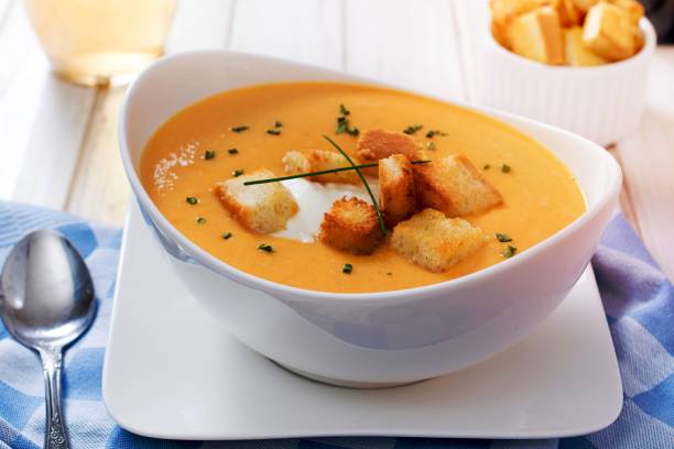 istock Pumpkin soup in bowl 1449032839