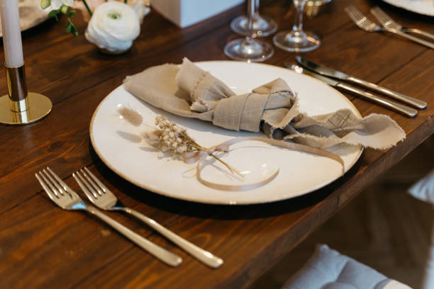 istock rustic table decoration with knotted cloth napkin for wedding dinner 1449034477