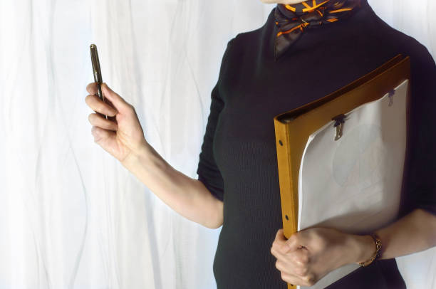 Image for Buisiness with Woman Holding Files/Studio Shot