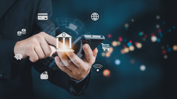 istock Businessman using mobile smartphone online banking and payment.Digital technology marketing financial and banking investment networking.icon online shopping. 1449036690