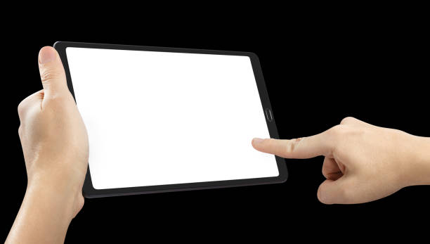 istock Hands touching blank screen of black tablet computer, on black 1449041241