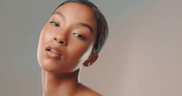 istock Studio shot of elegant young woman with glowing face 1449042068