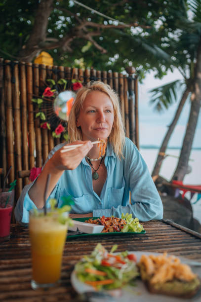 istock Enjoying a healthy breakfast and smoothies on vacation 1449044787