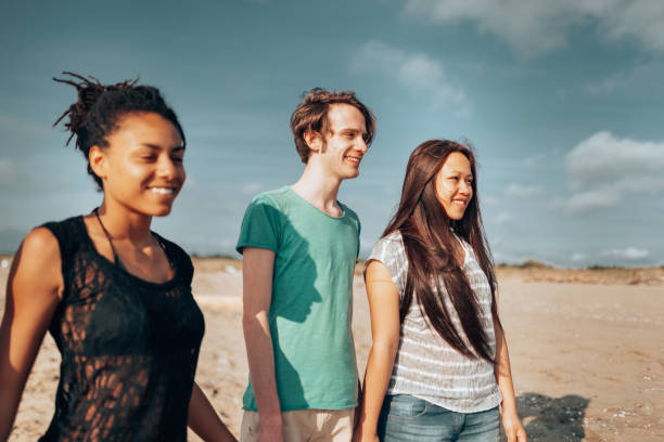 istock holding hands friends in summer 1449046657