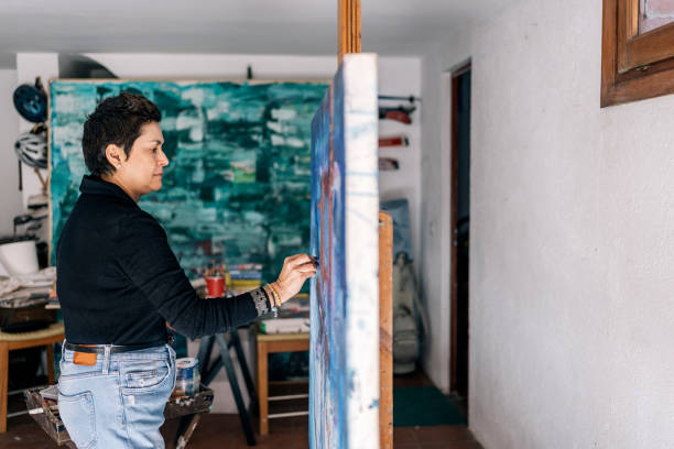 istock Female Artist in Home Art Studio 1449046801