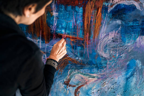 istock Painting in Colorful Canvas Close Up 1449046880
