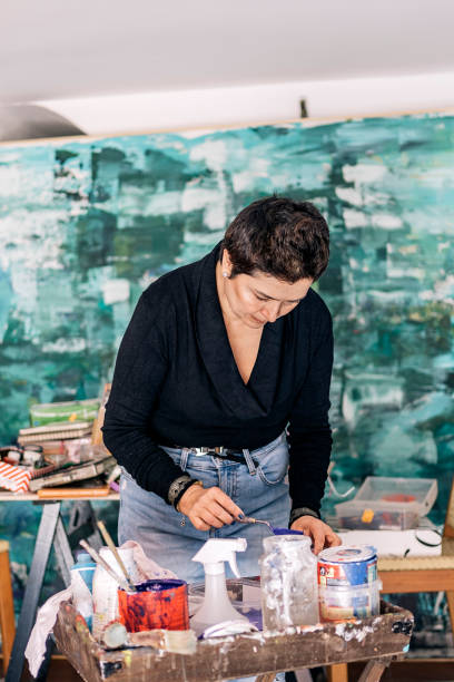 istock Female Artist Preparing Paint 1449047043