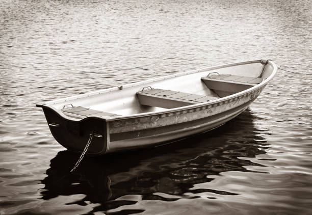 istock Rowboat at calm water 1449053534
