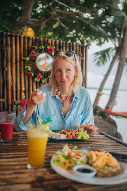 istock Enjoying a healthy breakfast and smoothies on vacation 1449054341