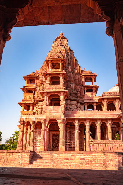 istock ancient hindu temple architecture with bright blue sky from unique angle at day 1449057684
