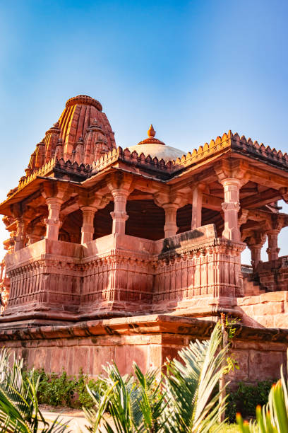 istock ancient hindu temple architecture with bright blue sky from unique angle at day 1449061783