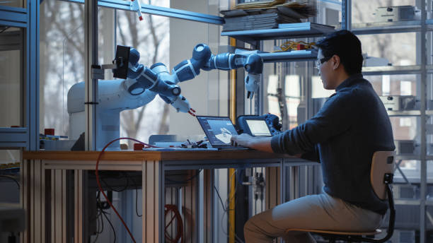 Robotics Programmer Occupation 4.500+ Engineer Programming Robot Stockfoto's, afbeeldingen en royalty ...