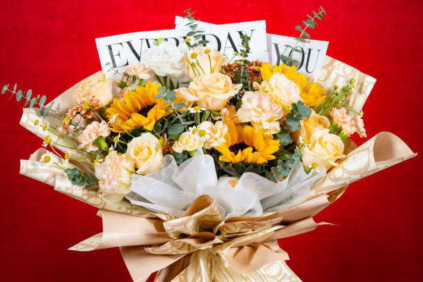 istock bunch of beautiful flowers as gife on red at horizontal composition 1449069838