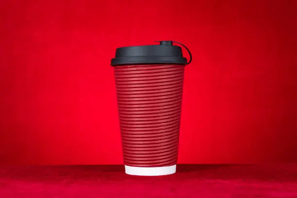 hotdrink paper cup on a red background horizontal composition