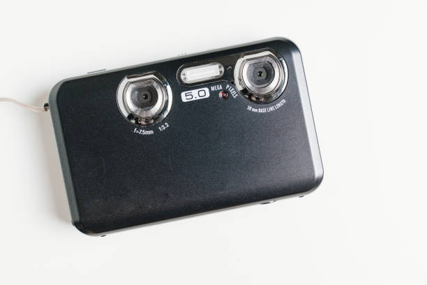 istock black stereoscopic camera on a white background. A camera with two lenses. 1449070088