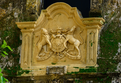 Toledo, Spain, decorative structure with a Latin inscription and a coat of arms