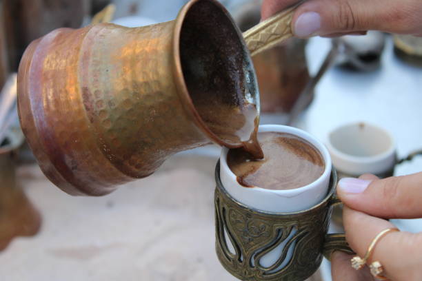 istock Ember , roasted Turkish coffee on the coal. Traditional Turkish coffee cooked on the coal,ember. 1449077481