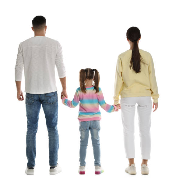 istock Little girl with her parents on white background, back view 1449082256