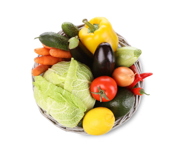 istock Wicker basket with fresh ripe vegetables and fruit on white background, top view 1449083288