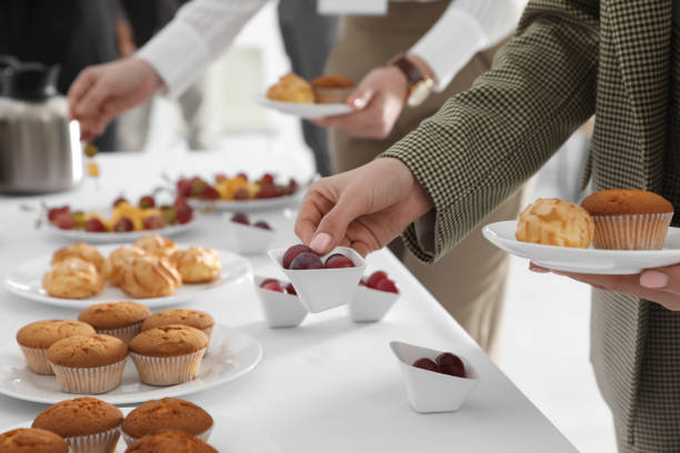 istock Woman taking snack during coffee break, closeup 1449083956