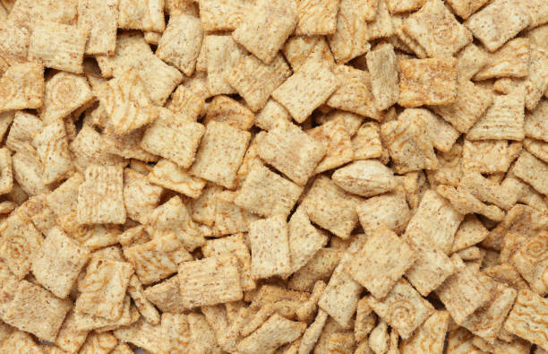 istock Crispy crackers as background, top view. Delicious snack 1449084046
