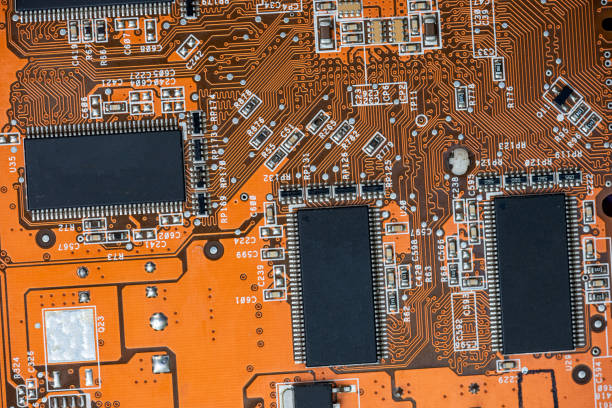 close up of Orange circuit board, motherboard technology background. computer component
