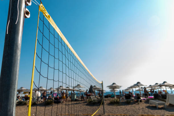istock A beach volleyball net on the beach with a clear and sunny sky 1449089315