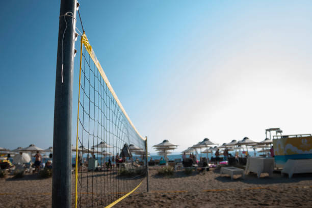 istock A beach volleyball net on the beach with a clear and sunny sky 1449090697