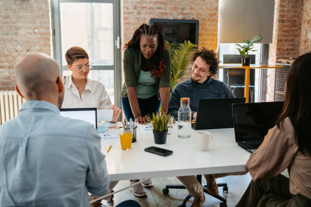 istock Colleagues Working Together In The Office 1449091425