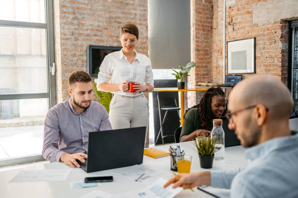istock Colleagues Working Together In The Office 1449093502