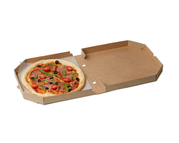 istock Pizza with prosciutto, tomatoes and cheese in a box on a white background 1449098387