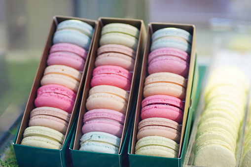 Close-up of colorful macaroons in store