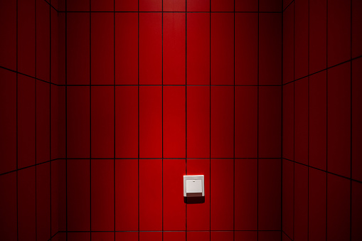 Lighting effect of red ceramic tile wall