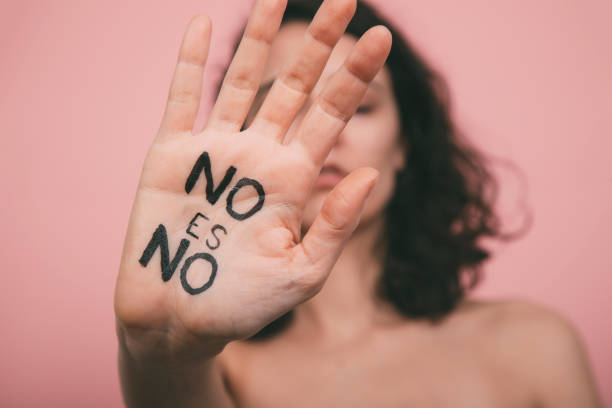 istock Woman's hand with vindictive painted letters. No means no concept. 1449106147