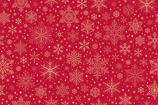Red seamless pattern with snowflakes. Vector rectangular background.