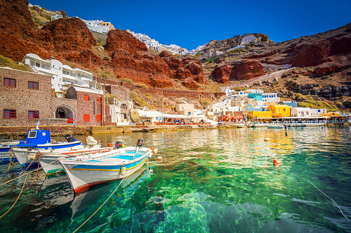 Amoudi bay with boats, port of Oia, Santorini Greece at sunny summer