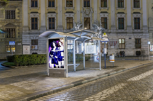 Vienna, Austria - December 9, 2009: bus stop in the first district by night without people.
