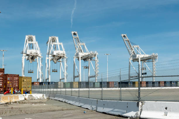harbor cranes to carry containers at Oakland harbor, San Francisco, USA