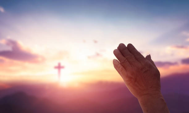 Christian Hands together up worship and pray stock photo