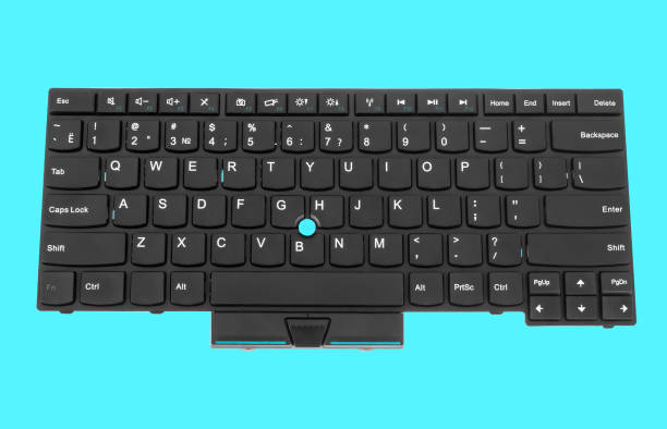 istock laptop keyboard, on a blue background 1449116256