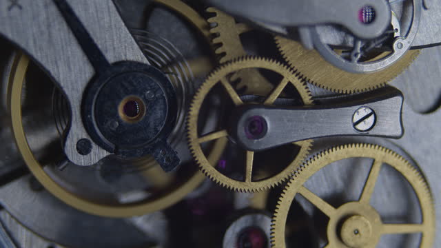 Macro close up of mechanical gears in vintage timepiece
