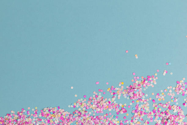istock creative festive frame with colors dots on blue pastel background, top view 1449119238