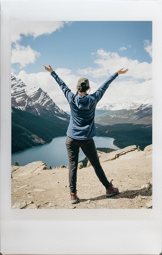Instant Film Portrait of a Beautiful Young Woman Hiking in Waterton Lakes National Park, Alberta, Canada