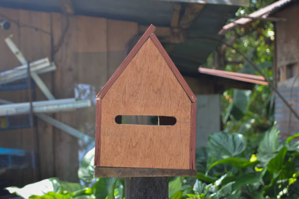 istock wooden mail box at the house yard. 1449126227
