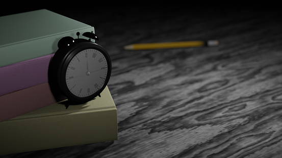 A black clock and a book pile on a gray wooden table (3D Rendering)