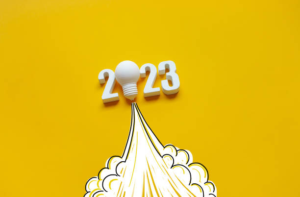 istock New year 2023 Ideas,inspiration concepts with rocket light bulb on yellow background 1449133563