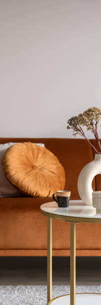 istock Elegant, copper colored sofa and decorations, vertical panorama 1449135487