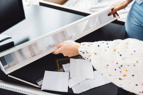istock Unrecognizable woman hands assembling something together for a project at school 1449137788