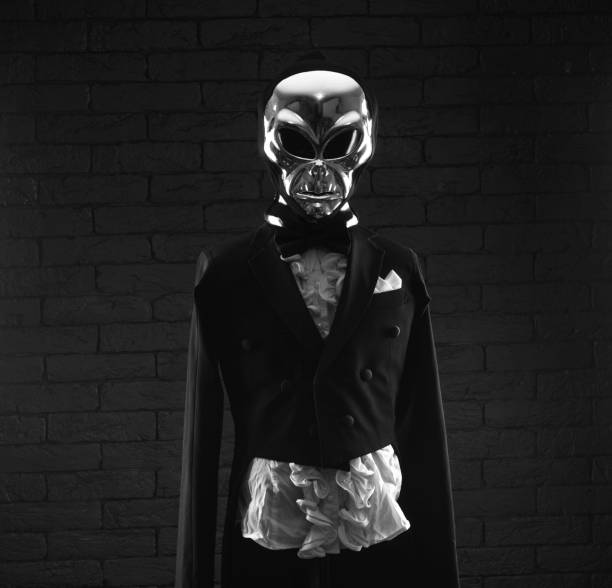 istock portrait of an alien on a black background 1449138516